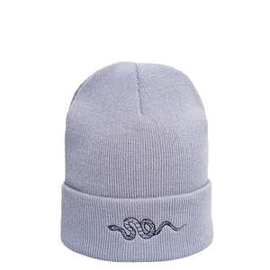 Minimalist light purple knit beanie featuring a black snake embroidery on folded cuff