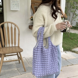 Chic purple bubble tote bag with popcorn texture, perfect for stylish everyday shoulder use