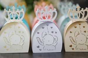 Detail of hollowed elephant candy box with crown top in assorted pastel colors