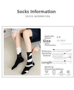 Detailed view of breathable black and white crew socks with size chart and washing care tips