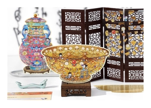 Macro detail of miniature Chinese vintage imperial art stickers with a golden bowl and screen
