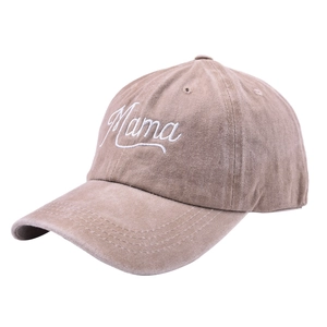 Detail of white Mama embroidery on a vintage khaki washed cotton baseball cap