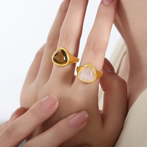Elegant gold titanium steel rings with natural tiger eye and rose quartz gemstones
