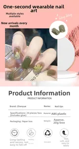 Detail of camellia floral press-on nails with pearl accents and glossy moss green finish