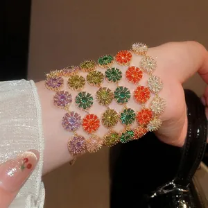 Elegant 18k gold plated bracelet featuring colorful zircon flower charms for women
