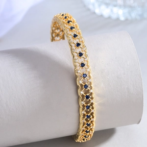 Elegant 18k gold plated mesh cuff bracelet with blue gemstones and white crystals