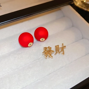 Festive Chinese New Year stud earrings with red beads and golden Facai characters