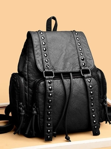 Fashion black rivet backpack in washed leather with textured lychee grain and fringe zippers