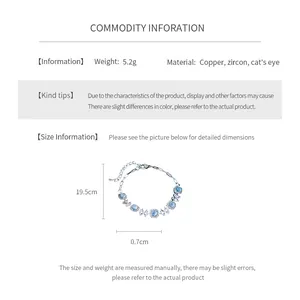 Vue détaillée de la longueur et des fleurs en zircon sur le bracelet œil de chat