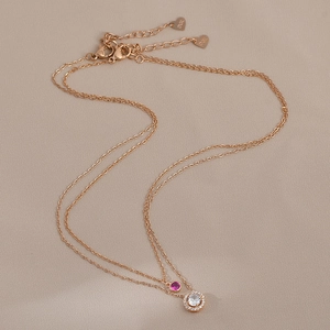 Elegant rose gold double layer necklace with micro-paved red and white zircon pendants