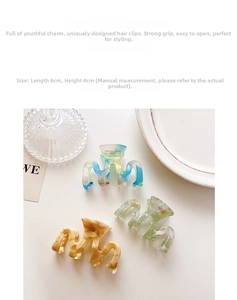 Detail view of 6x4cm tortoiseshell hair claw clips with marble texture and dimensions