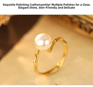 Macro shot of S925 silver bamboo joint ring with polished gold finish and white pearl