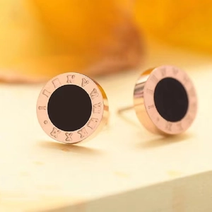 Minimalist Roman numeral stud earrings in rose gold with black inlay design