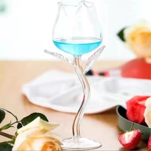 Elegant French style rose shaped wine glass with green stem for romantic cocktail serving