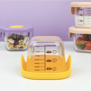 200ml borosilicate glass baby food bowl with yellow silicone base and volume markings
