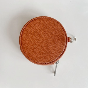 Brown lychee pattern leather round coin purse with silver zipper and keychain hook