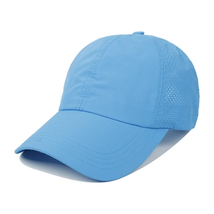 Macro detail of the light blue ponytail baseball cap featuring breathable side mesh panels