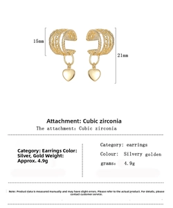 Macro detail of heart drop earring with cubic zirconia dimensions and gold plating