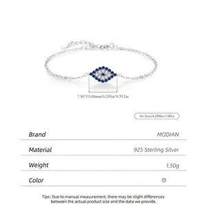 Bracelet œil en argent sterling S925 avec zircons bleus et blancs sur fond blanc