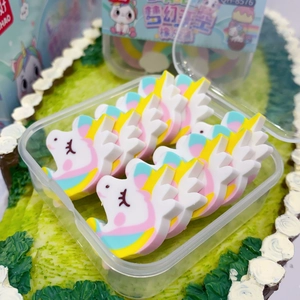 Detailed view of colorful unicorn-shaped TPR erasers neatly arranged in a clear plastic box