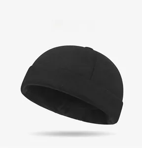 Detail view of winter woolen docker hat featuring thick warm fabric and metal buckle