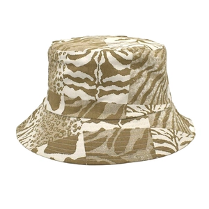 Detail of canvas bucket hat featuring a mix of leopard and zebra animal prints