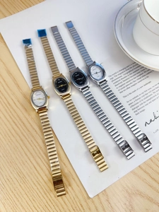Multiple views of elegant oval quartz watches with gold and silver metal bracelets
