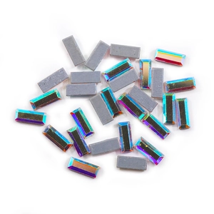 Macro shot of rectangular AB crystal rhinestones with iridescent faceted glass surface