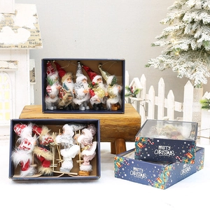 Christmas Santa Claus doll figurines set in gift boxes for holiday window decorations