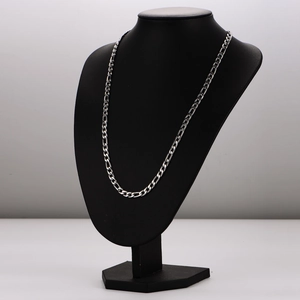 Silver Figaro chain necklace in stainless steel displayed on a black neck mannequin stand