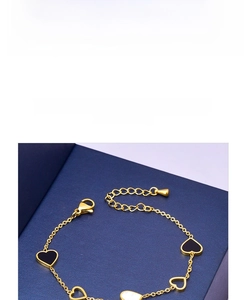 Detailed view of titanium steel heart bracelet with enamel pendants and 2.4g weight marker
