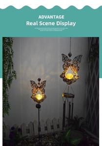 Solar wind chime and garden stake light featuring a hollow metal angel with warm LED glow