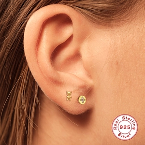 S925 sterling silver teddy bear and sparkling zircon disc earrings worn on earlobe