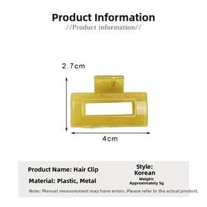 Detail view of small amber jelly hair claw clip with 2.7x4cm size dimensions