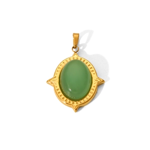 Detailed macro view of an oval green natural stone pendant in a gold-plated vintage frame