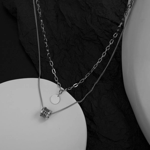 Silver double layer stainless steel necklace with cylindrical and round pendants