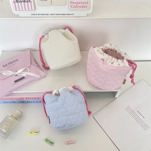 Quilted cotton drawstring organizer bags in minimalist heart and striped patterns