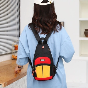 Outdoor leisure crossbody bag with red and yellow contrast colors and adjustable strap