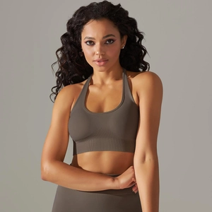Detail of coffee brown ribbed seamless fabric on women's yoga set with racerback bra