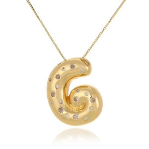 Macro view of chubby letter G pendant in 18k gold plating with sparkling cubic zirconia
