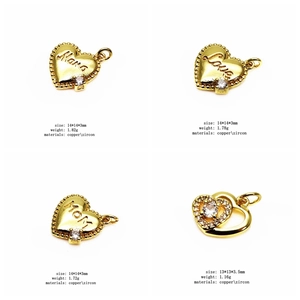 Detailed view of gold heart pendants with Mama and Love engravings and cubic zirconia