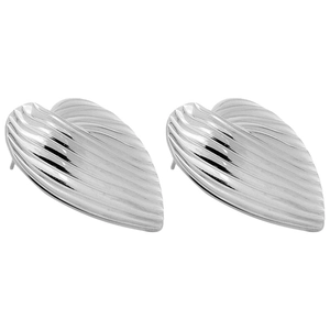 Macro view of silver heart earrings with vertical 3D striped texture on white background