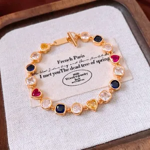 18K gold plated vintage bracelet featuring colorful mixed gemstones and OT buckle