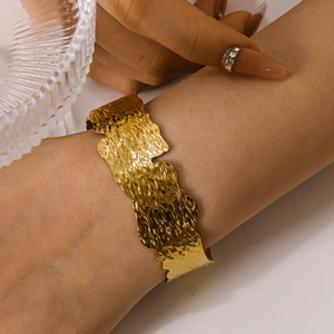 Vintage 18K gold plated stainless steel cuff bracelet with irregular leaf texture