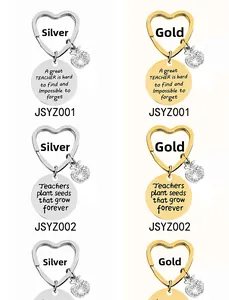 Macro detail of heart-shaped keyrings with apple charms and engraved appreciation tags