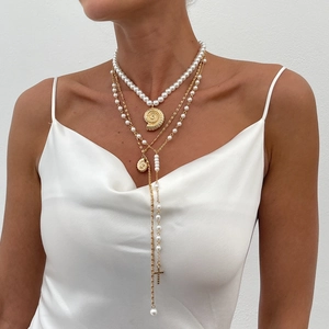 Three-layer bohemian gold necklace set with faux pearls, seashell and cross pendants