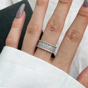 Elegant S925 sterling silver wide ring with geometric olive leaf zircon patterns on finger
