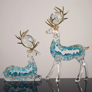 Elegant set of two resin elk statues with gold antlers and blue crystal interior decor