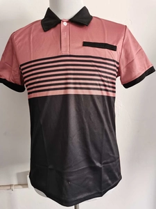 Detail of pink and black contrast polo shirt with breathable mesh texture and stripes