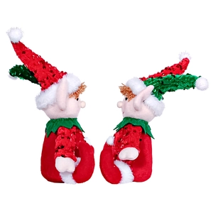 Close-up of red and green sequin Christmas elf figurines with white pom-pom hats